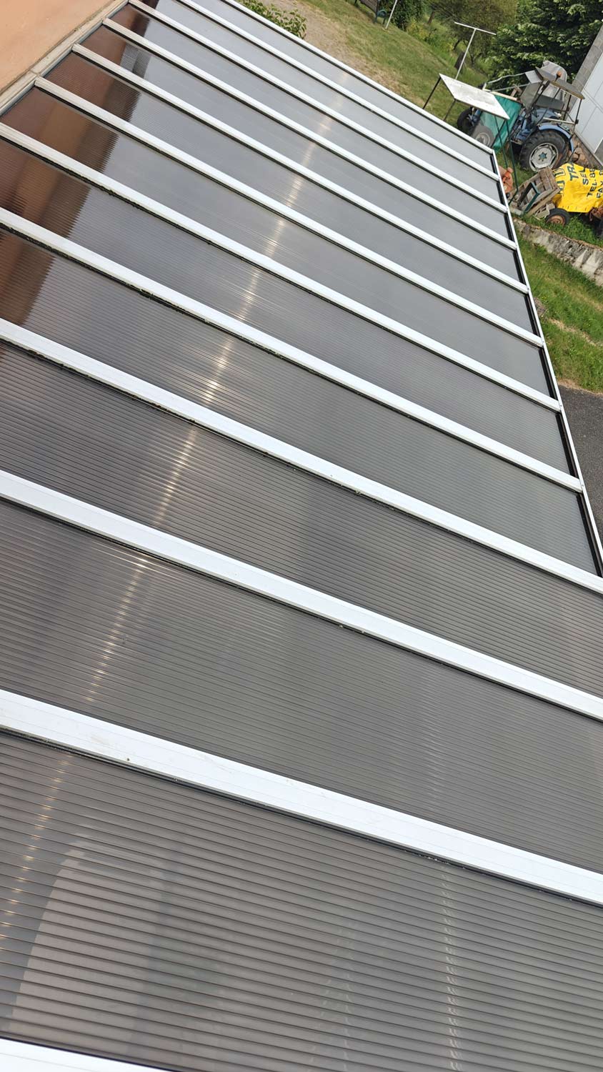 Décrassage du dessus d’une véranda en plexiglas près de Sélestat